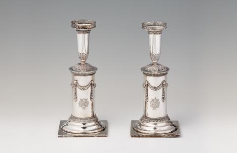 Peter van Leenhoff - A pair of Soest silver candlesticks