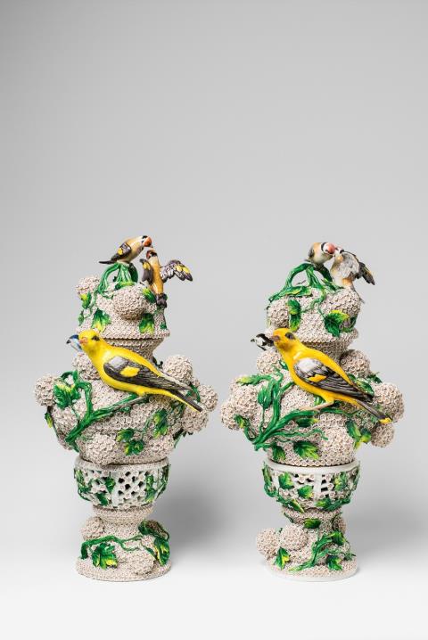 A pair of Meissen porcelain snowball flower vases with birds