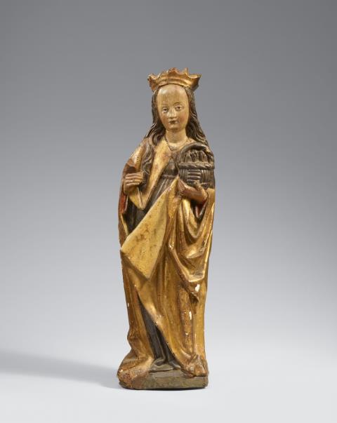  Central Germany - A carved wooden figure of Saint Dorothy, probably Central German, 2nd half 15th century