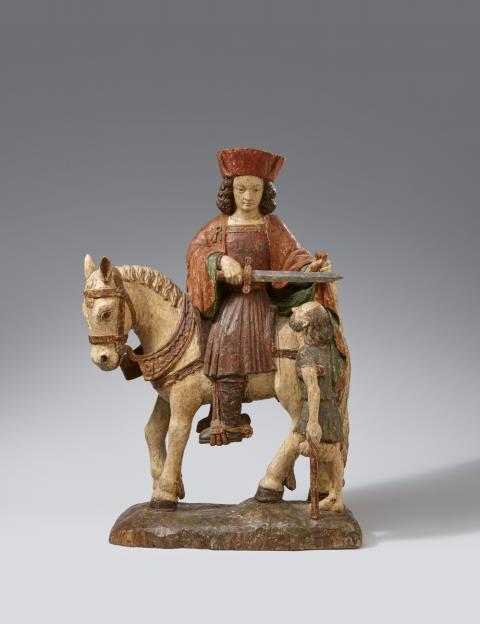 Probably Flemish early 16th century - An early 16th century Flemish carved wood figure of Saint Martin