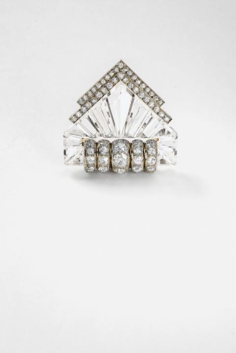 Suzanne Belperron - An Art Deco 18k gold, rock crystal and diamond "Éventail" clip brooch