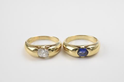 A pair of 18k gold eternity rings