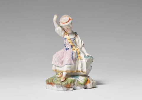 A Höchst porcelain model of a girl in a sash