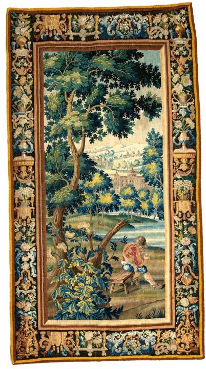 A Flemish tapestry with a peasant scene