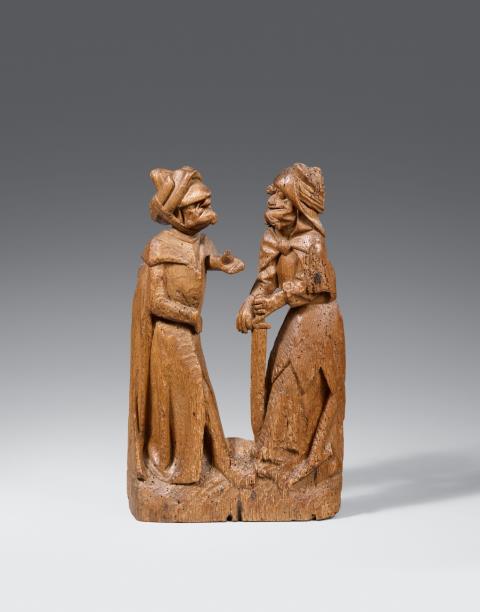 Flemish circa 1520/1530 - A Flemish carved wood group of two soldiers, circa 1520/30