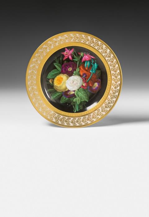 Ernst Sager - A Berlin KPM porcelain plate with flowers, signed by Ernst Sager