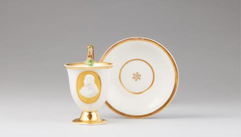 Leonhard Posch - A Berlin KPM porcelain cup with a depiction of Christ