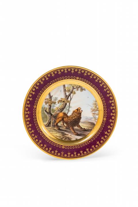 A Sèvres porcelain plate with a fable from the "fond pourpre" service