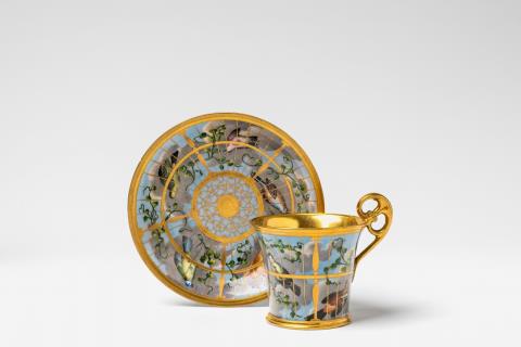  Vienna, Imperial Manufactory directed by Matthias Niedermayer - A Vienna porcelain cup and saucer with birdcage decor