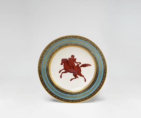 A Vienna porcelain plate with a red horseman