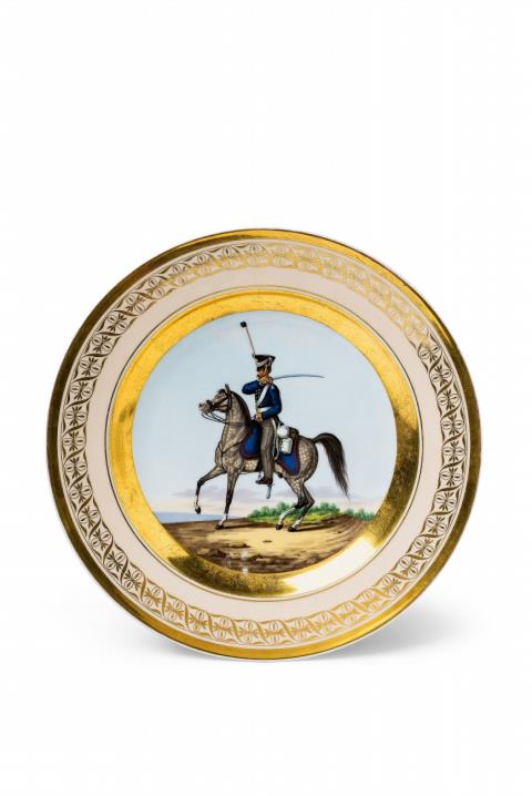 Franz Krüger - A Berlin KPM porcelain plate with a Prussian cavalryman