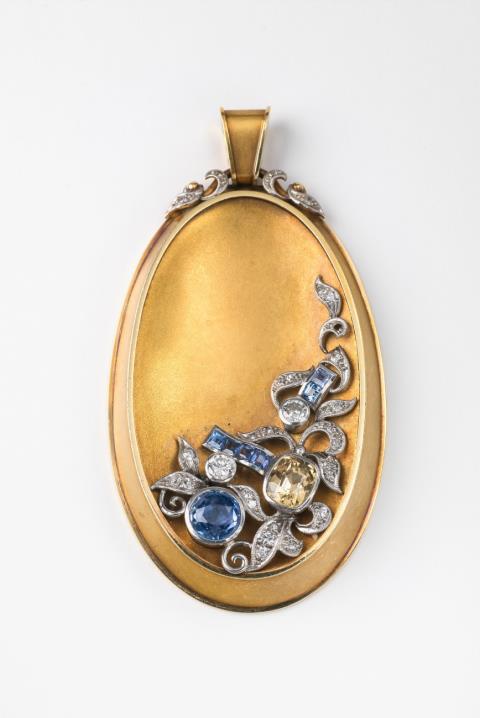 Rudolf Christmann - A 14k gold diamond and sapphire pectoral pendant
