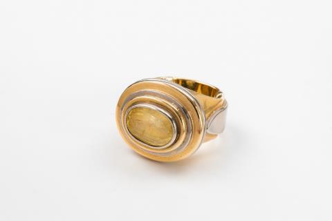 Wilhelm Nagel - An 18k gold ring with a yellow sapphire
