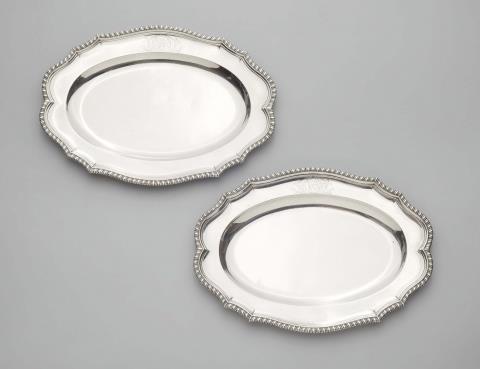 Edward Wakelin - A pair of George II silver platters