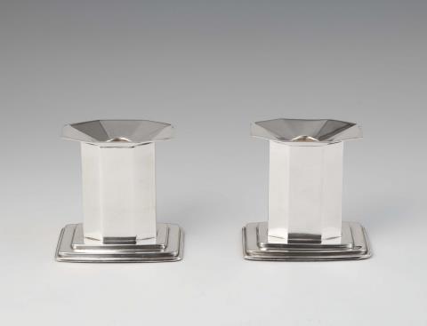  Delheid Frères - A pair of Art Deco silver candlesticks
