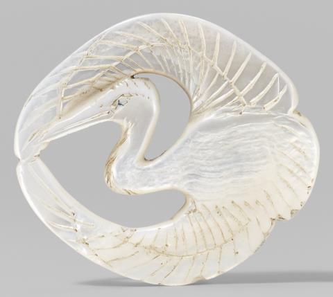 A mother-of-pearl netsuke of a crane. 19th century