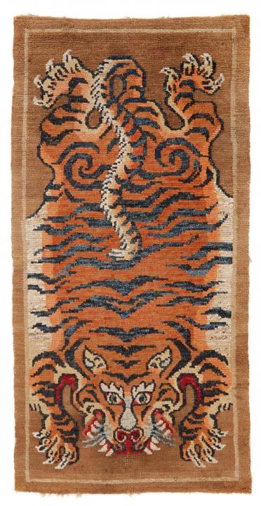 A Tibetan wool tiger-carpet (khaden). Early 20th century