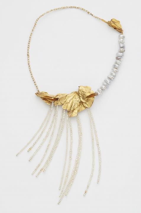 A 14k gold and pearl necklace