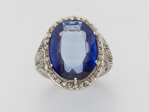 A Belle Epoque 14k white gold and synthetic sapphire ring