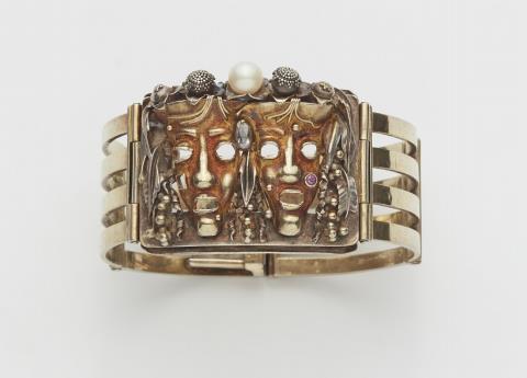 Johann Michael Wilm the Elder - A silver gilt bracelet with a mask