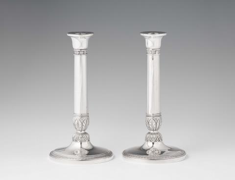 Jean Francois Warnots - A pair of Brussels silver candlesticks