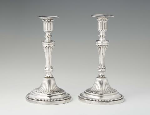 A rare pair of Turin silver candlesticks