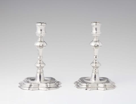 Theodor Mathias Gennerup - A pair of Riga silver candlesticks
