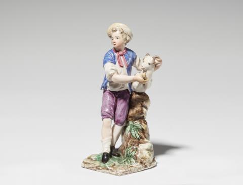  Faïencerie de Niderviller - A Niderviller faience figure of a boy with a ram
