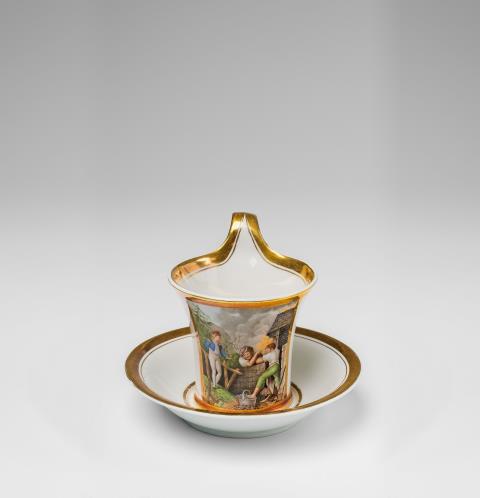  Fürstenberg - A Fürstenberg porcelain cup with a scene of porcelain making