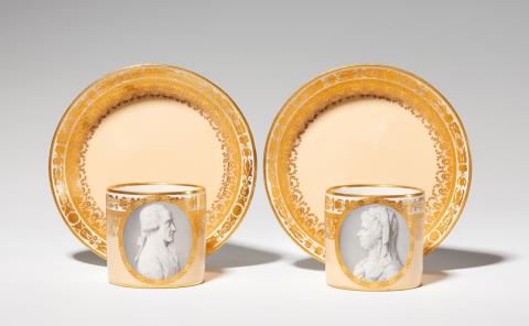 An important pair of Vienna porcelain cups with a double portrait