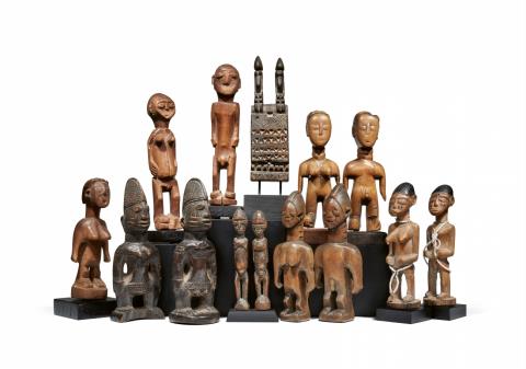 FOURTEEN WEST AFRICAN CARVINGS