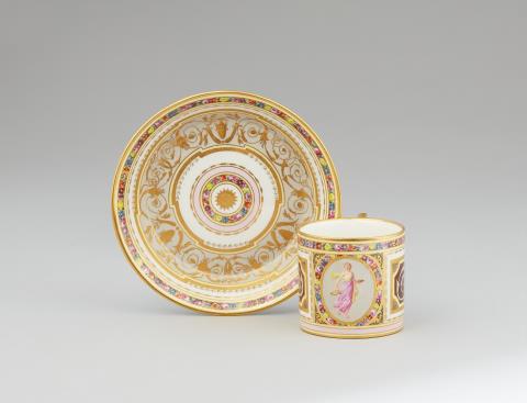 A Vienna porcelain cup and saucer with floral wreaths