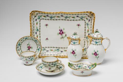  Vienna, Imperial Manufactory - A Vienna porcelain tête à tête with Atlas decor