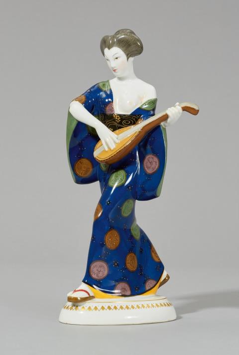 Adolph Amberg - A Berlin KPM porcelain figure of a Japanese lady with a mandolin