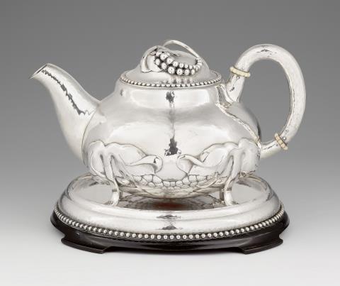 Evald Nielsen - A Copenhagen silver teapot and stand by Evald Nielsen