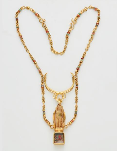 Wolfgang Skoluda - A 22k gold necklace with an Egyptian amulet