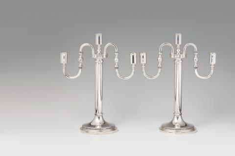 A pair of Stockholm silver girandoles