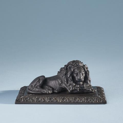 Theodor Kalide - A cast iron lion paperweight