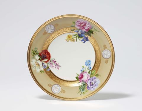  Vienna, Imperial Manufactory directed by Matthias Niedermayer - A Royal Vienna porcelain plate with three bouquets
