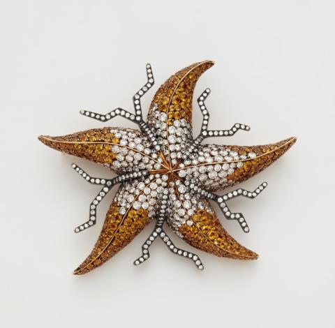 Georg Hornemann - An 18k gold diamond and sapphire starfish brooch