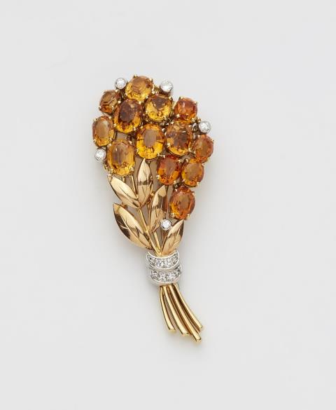  Gubelin - An 18k gold Madeira citrine clip brooch