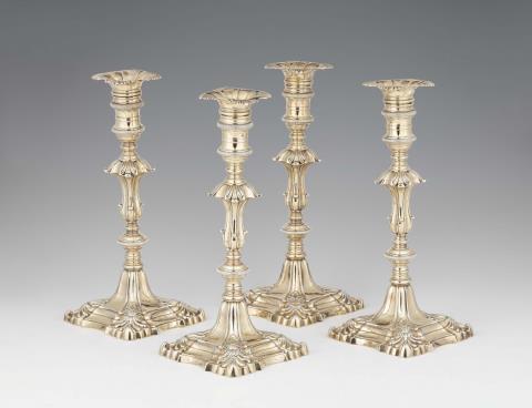 A set of four George II silver candlesticks