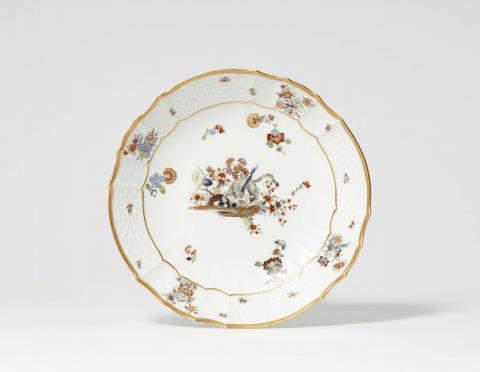 Johann Friedrich Eberlein - A Meissen porcelain dish with yellow lion motifs