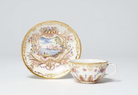 Johann Friedrich Metzsch - A Meissen porcelain cup and saucer with coloured bay leaf reliefs