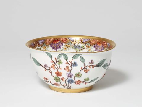 Johann Friedrich Metzsch - A Meissen porcelain slop bowl from a service with prunus motifs