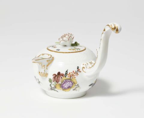 Johann Friedrich Eberlein - A Meissen porcelain teapot with woodcut flowers