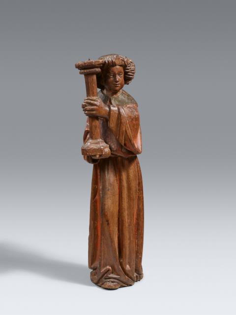 Flemish 3rd quarter 15th century - A Flemish carved wood angel candlestick, third quarter 15th century