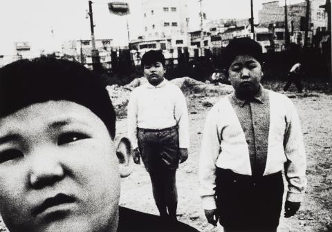 Daido Moriyama - Children who are too grownup (from the series: The Island with 100 Million People 48)