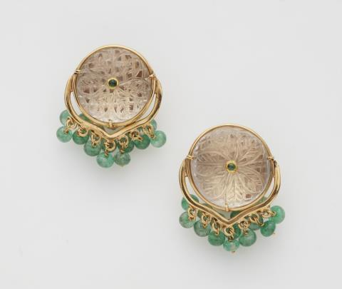 A pair of 18k gold and rock crystal clip earrings