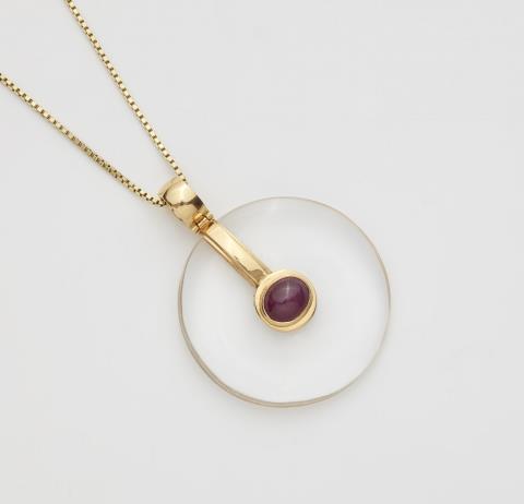 An 18k gold ruby and quartz pendant necklace